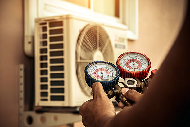 Professional Air Conditioning Service technician working in Hendersonville, PA